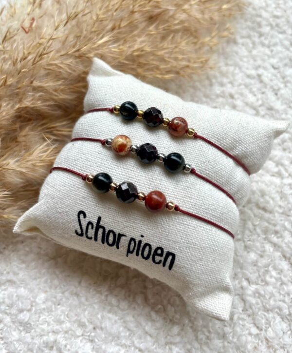Overzicht van Schorpioen geboortesteen armbandjes in drie kleuren: goud, zilver en rosegoud